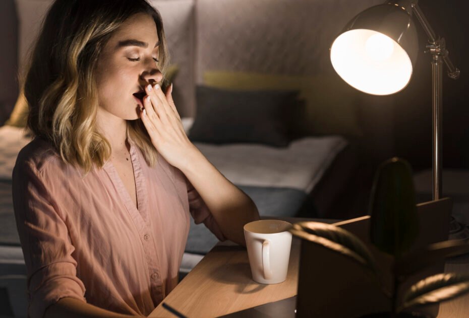 side-view-blonde-woman-working-late